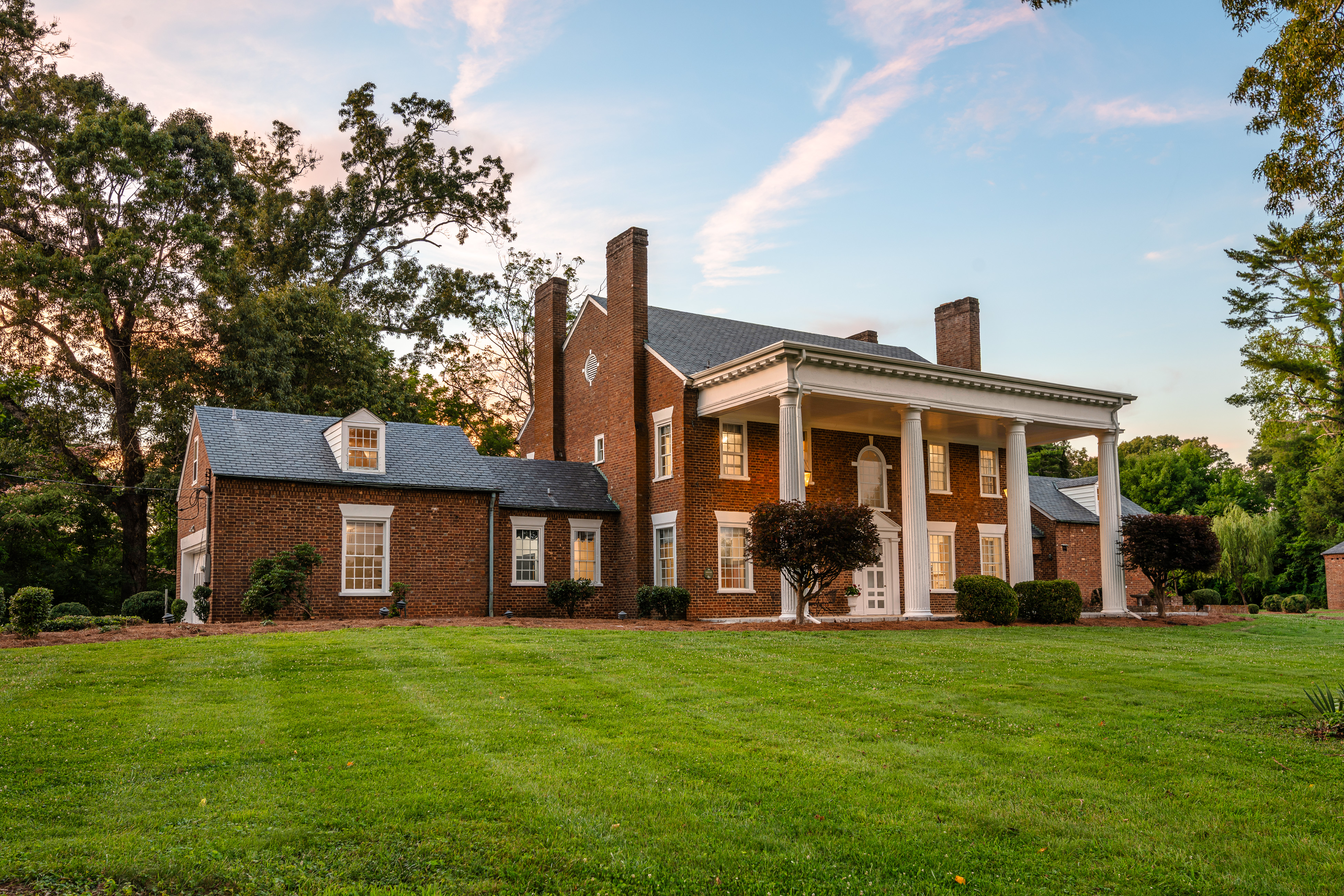 The front elevation across the lawn