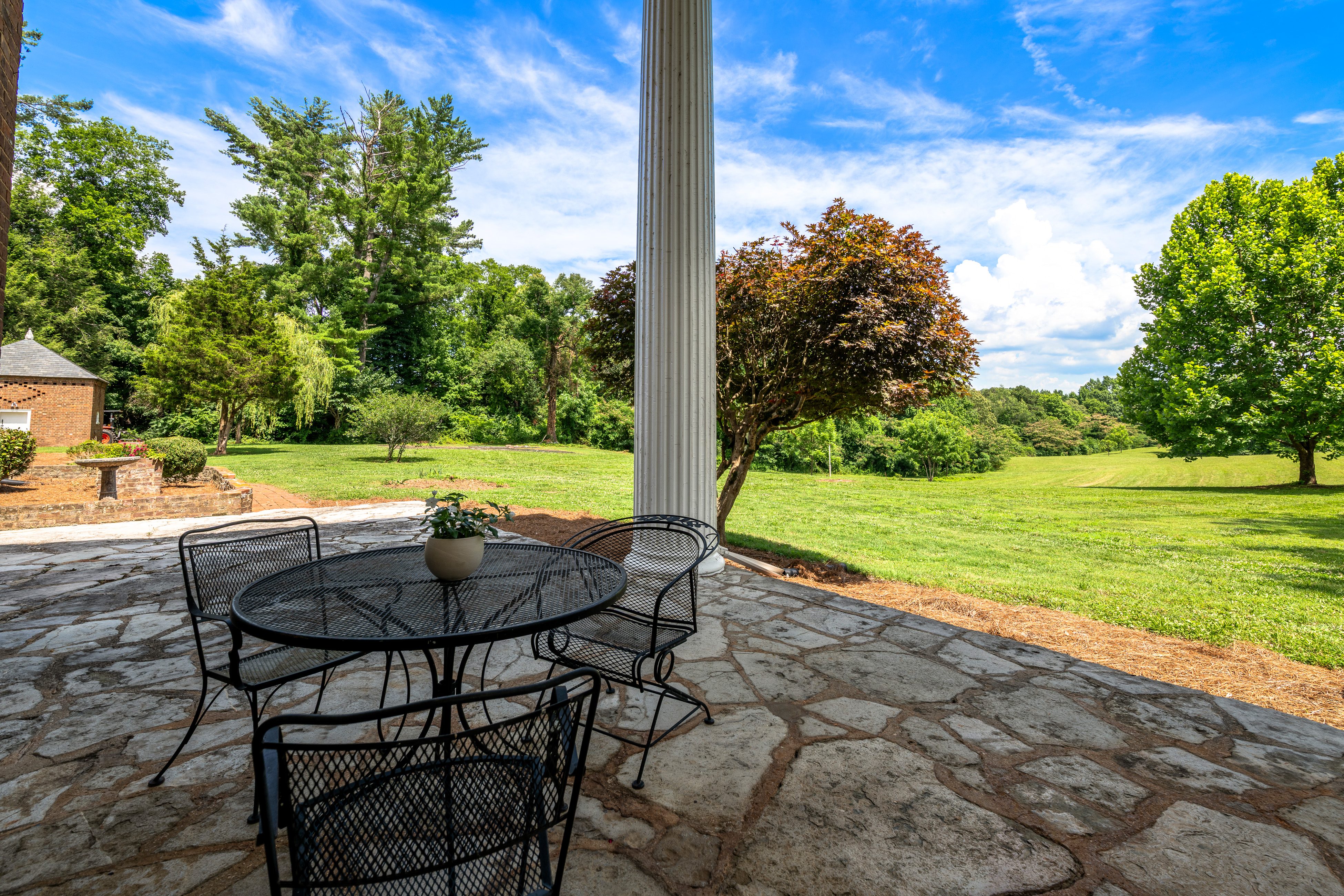 The stone terrace beneath the Doric columns
