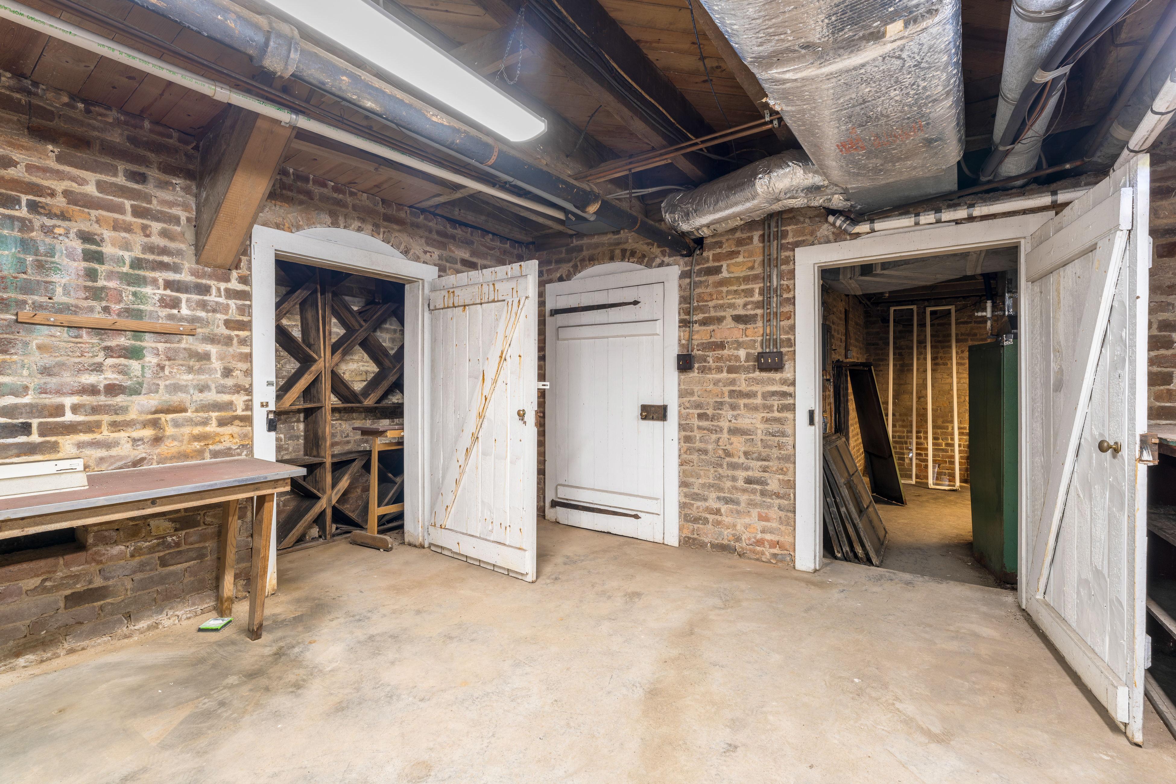 The workshop and storage rooms beneath the manor