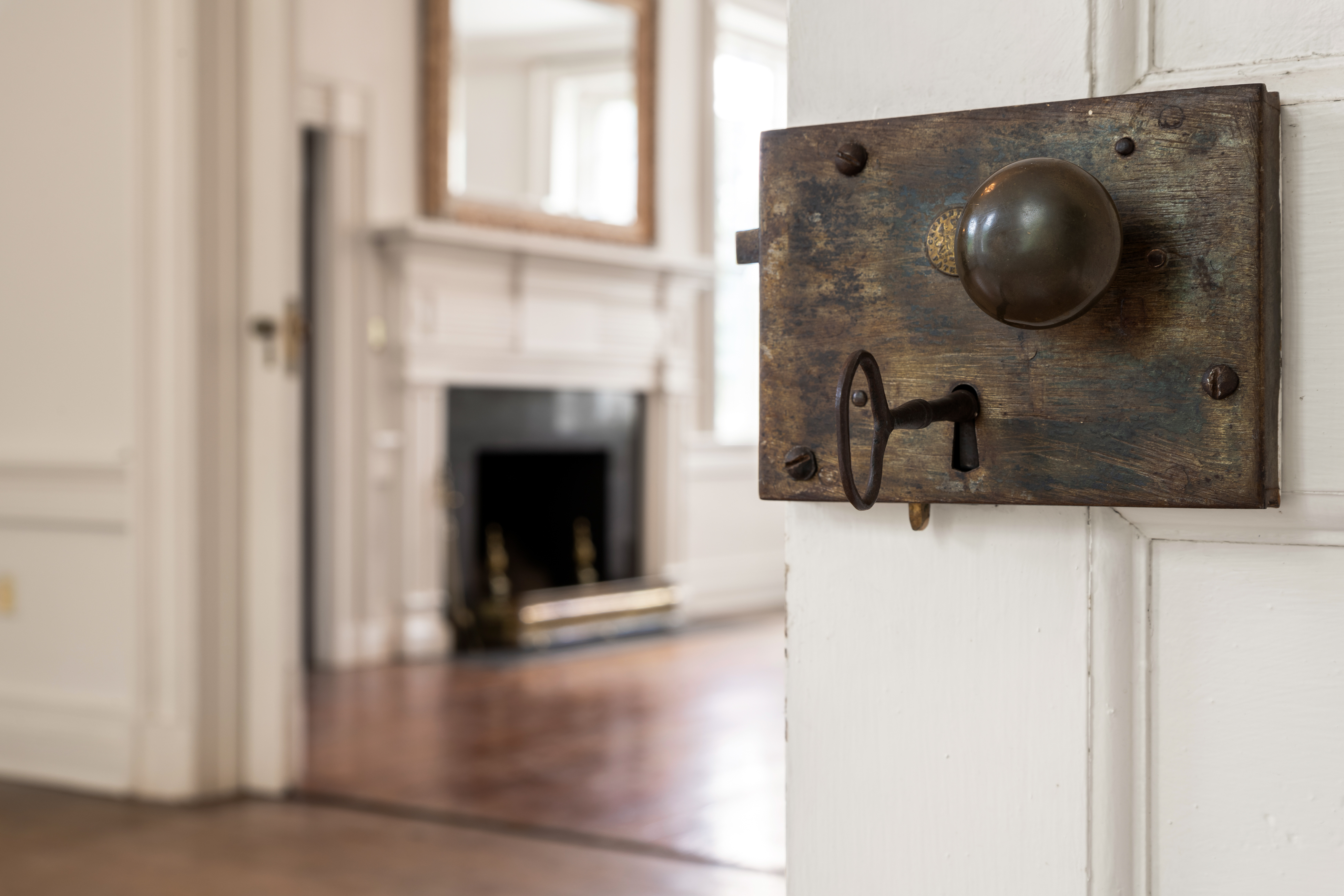 Original brass doorknob and iron escutcheon