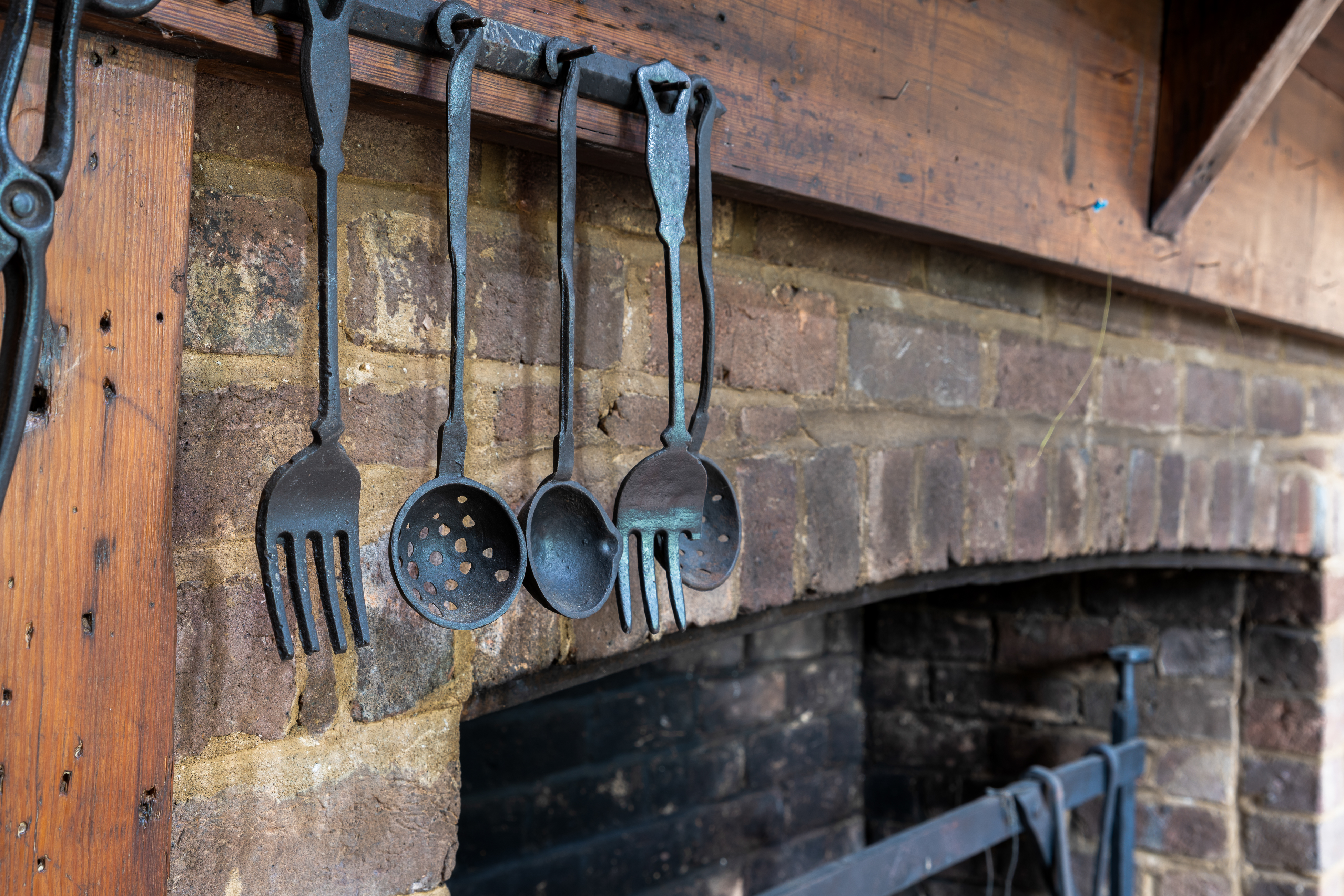 The keeping-room cooking fireplace and utensils