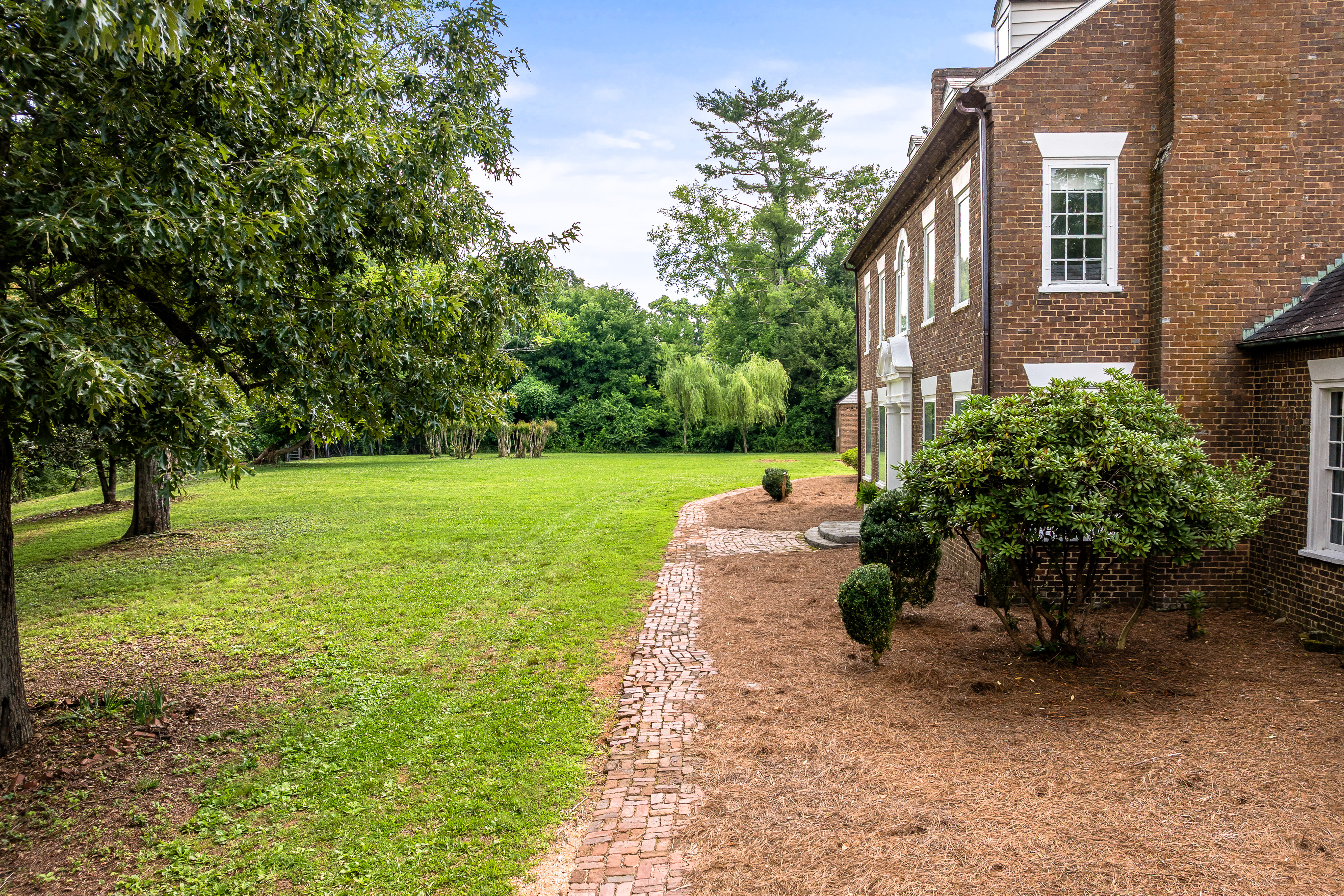 The side elevation with brick service walk