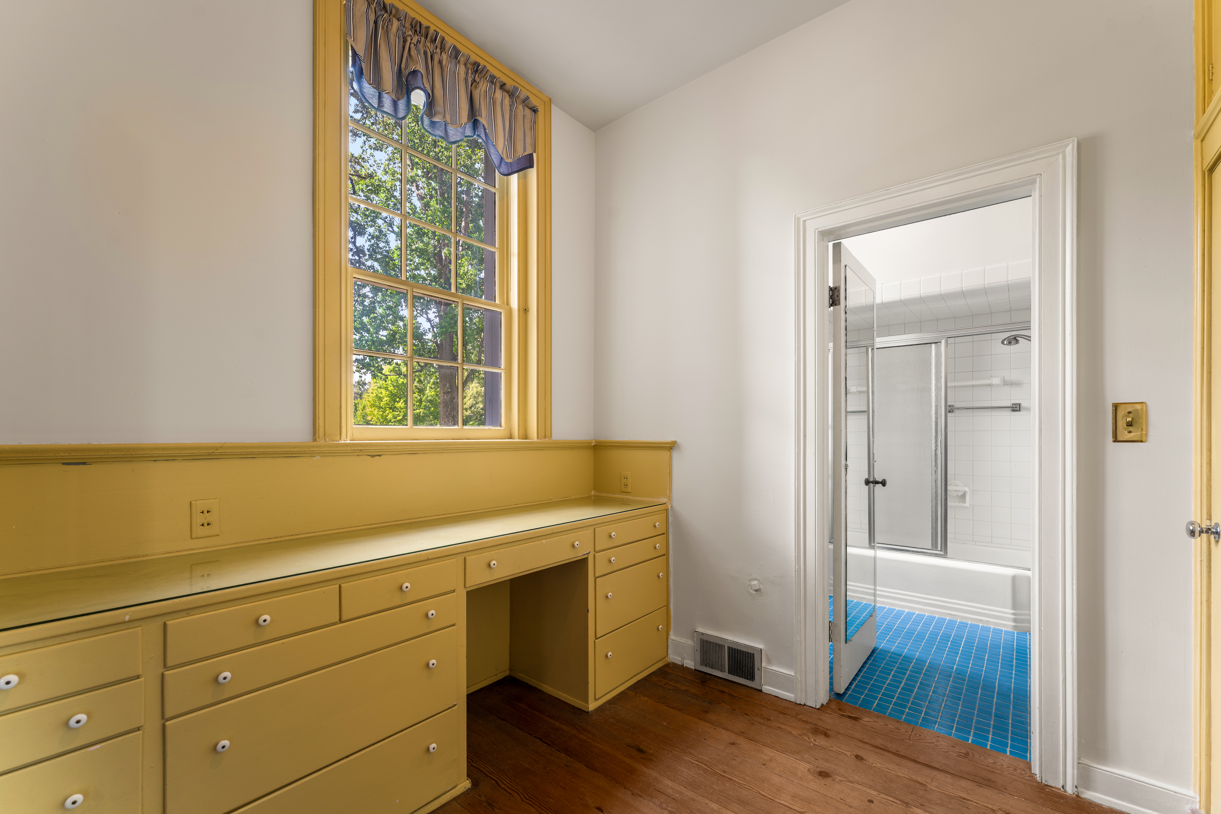 A dressing room with built-in vanity