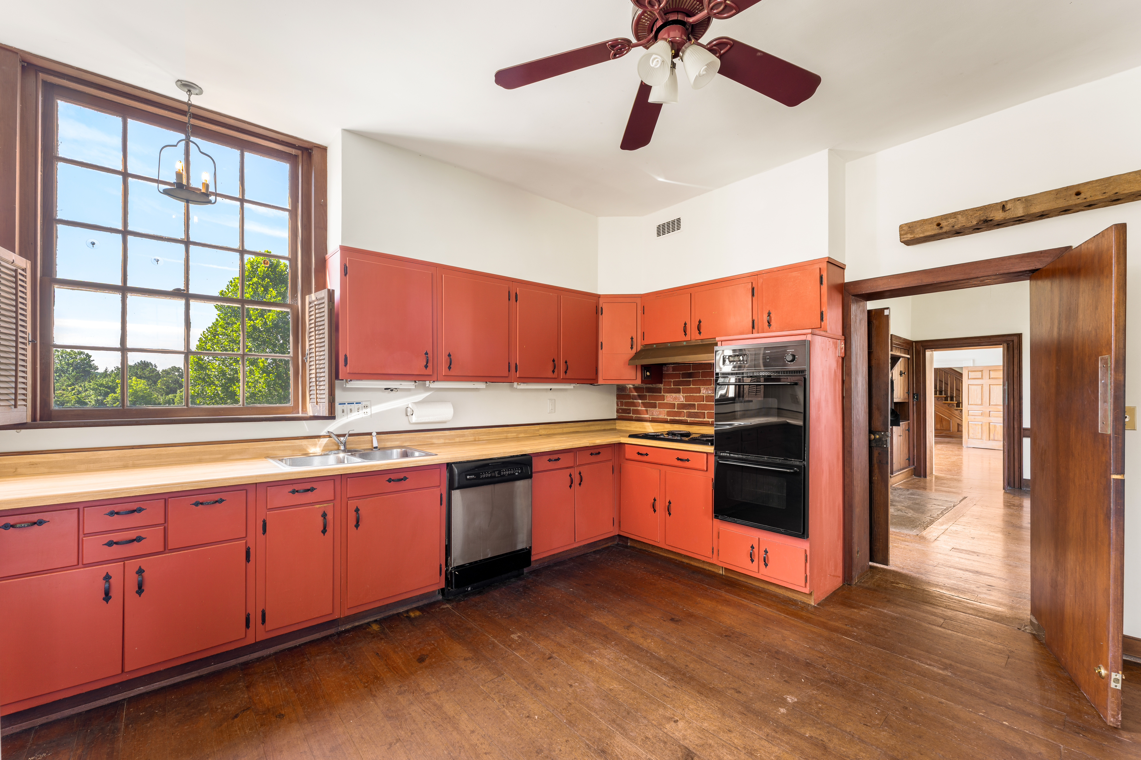 The kitchen, wide view toward the breakfast area