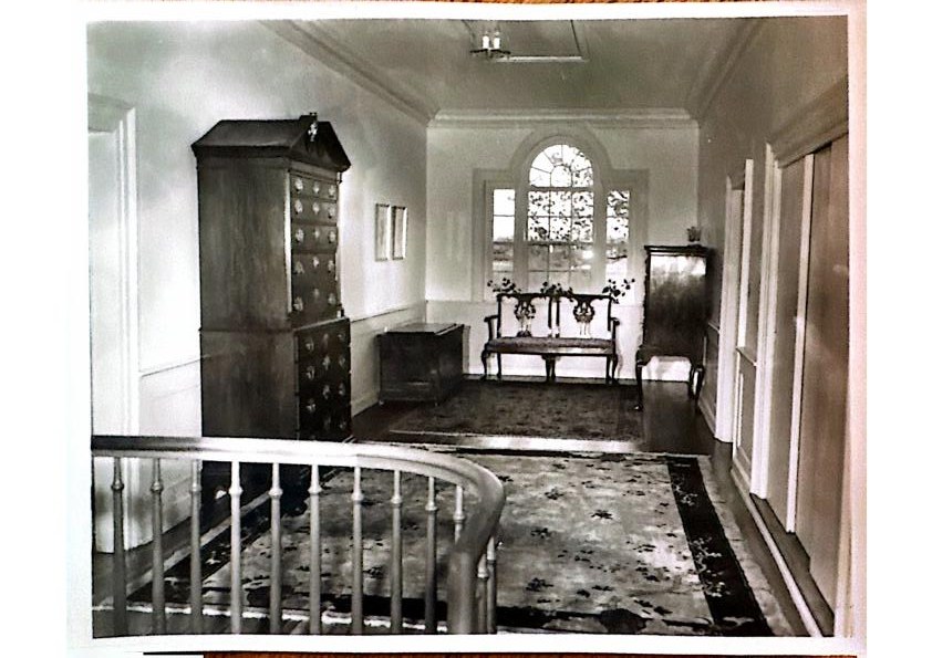 A landing beneath the arched Palladian window