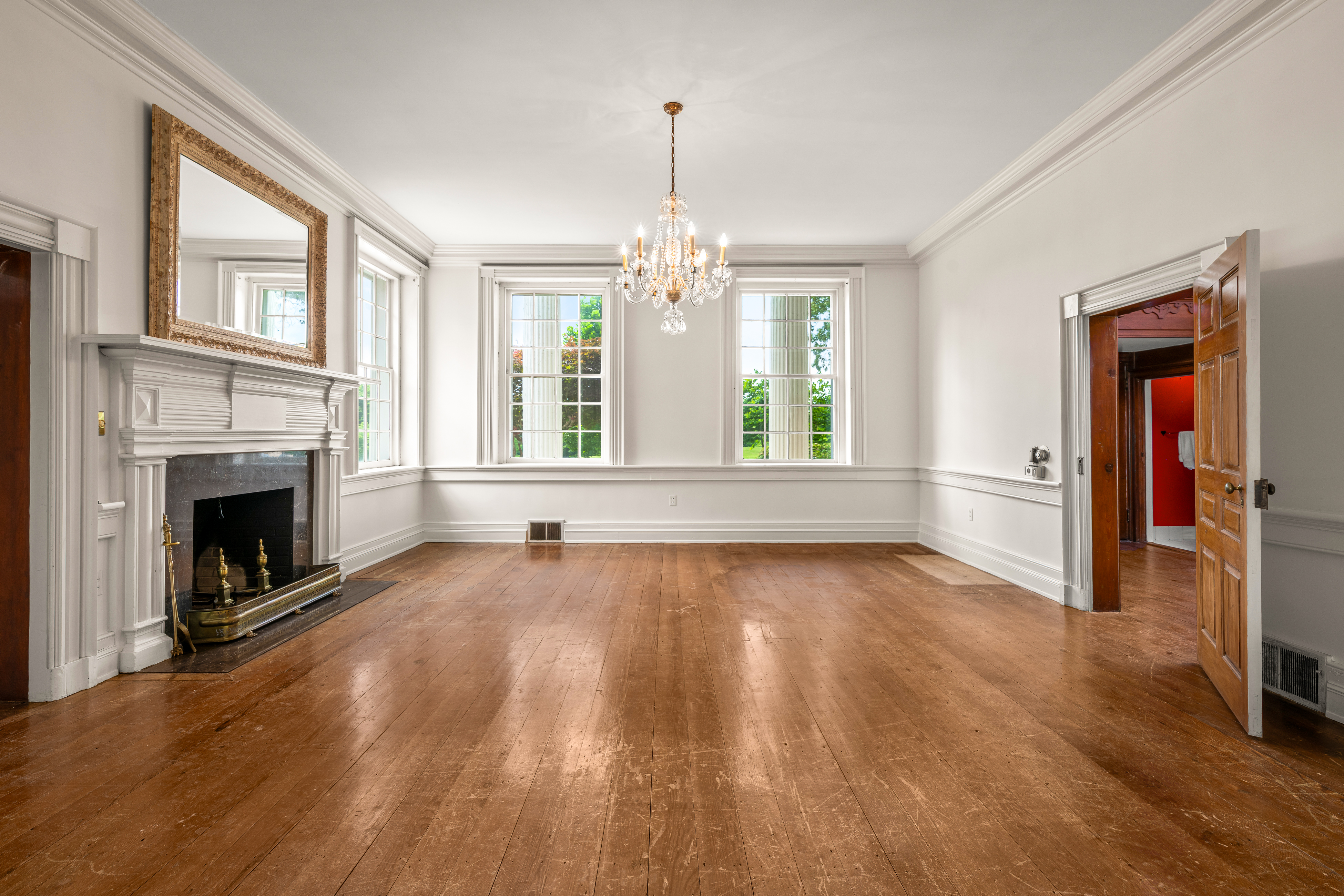 Enfilade — reception rooms aligned along the central hall